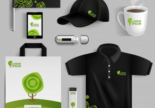 Decorative elements of corporate identity with green tree symbol in realistic style with pen usb flash drive bag cup baseball cap isolated vector illustration